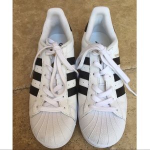 White Adidas Superstars